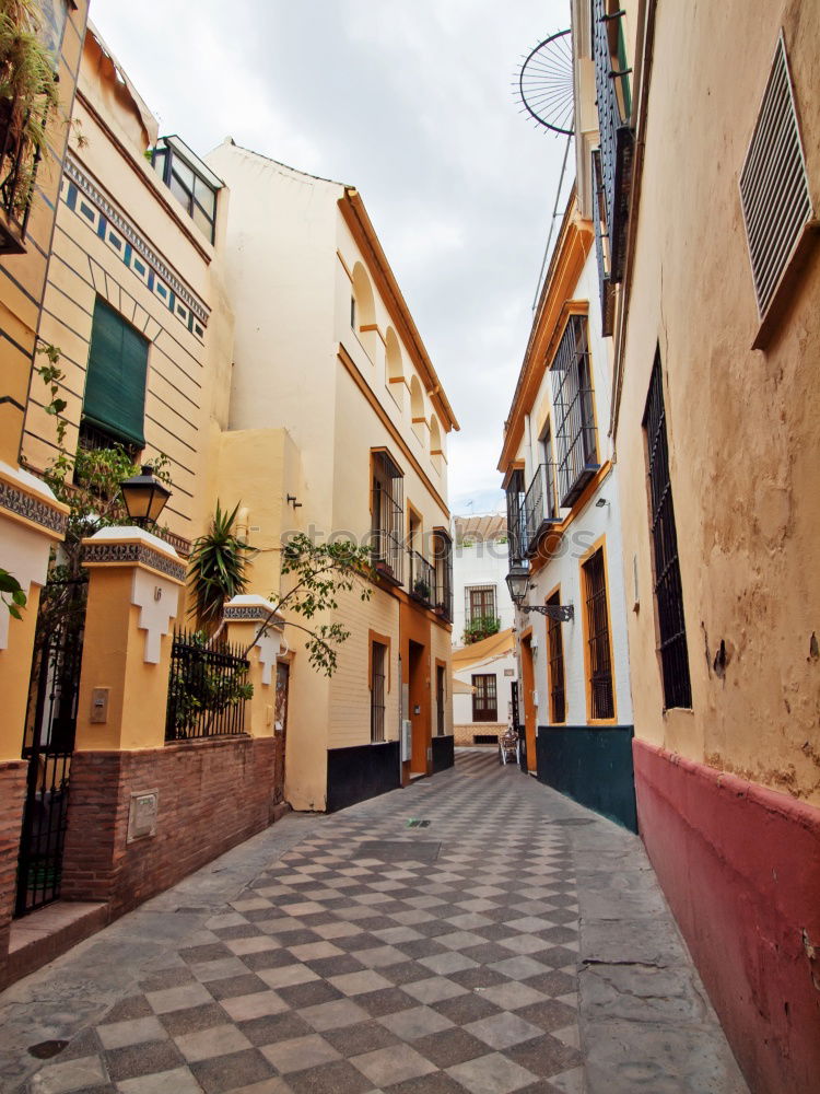 Similar – Image, Stock Photo pretty colorful alleyway in Havana with view to the harbour