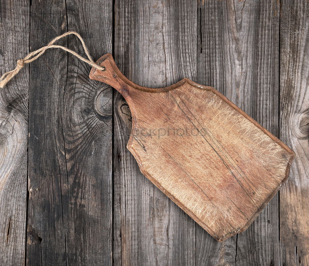 Similar – Empty very old wooden kitchen cutting board