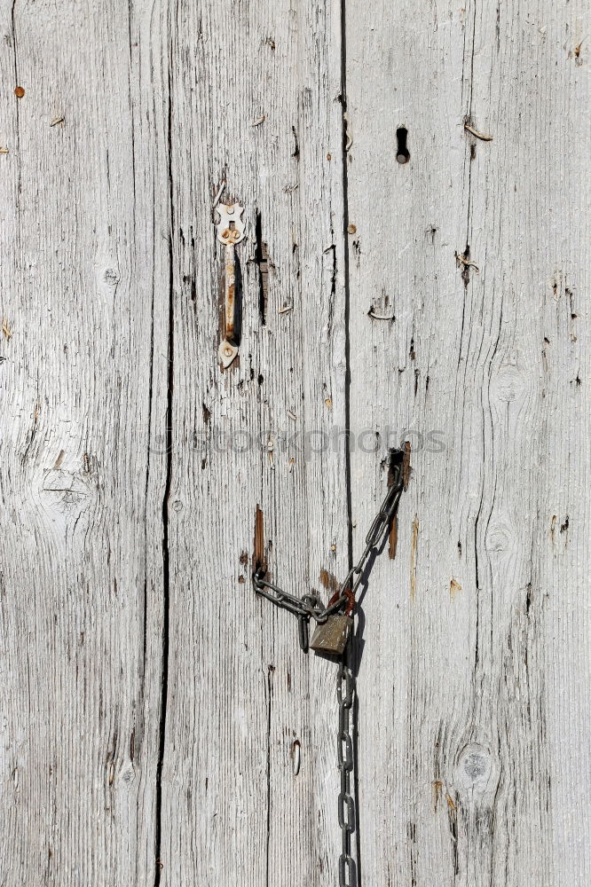 Similar – Pliers and twine on a plank with old rusty nail