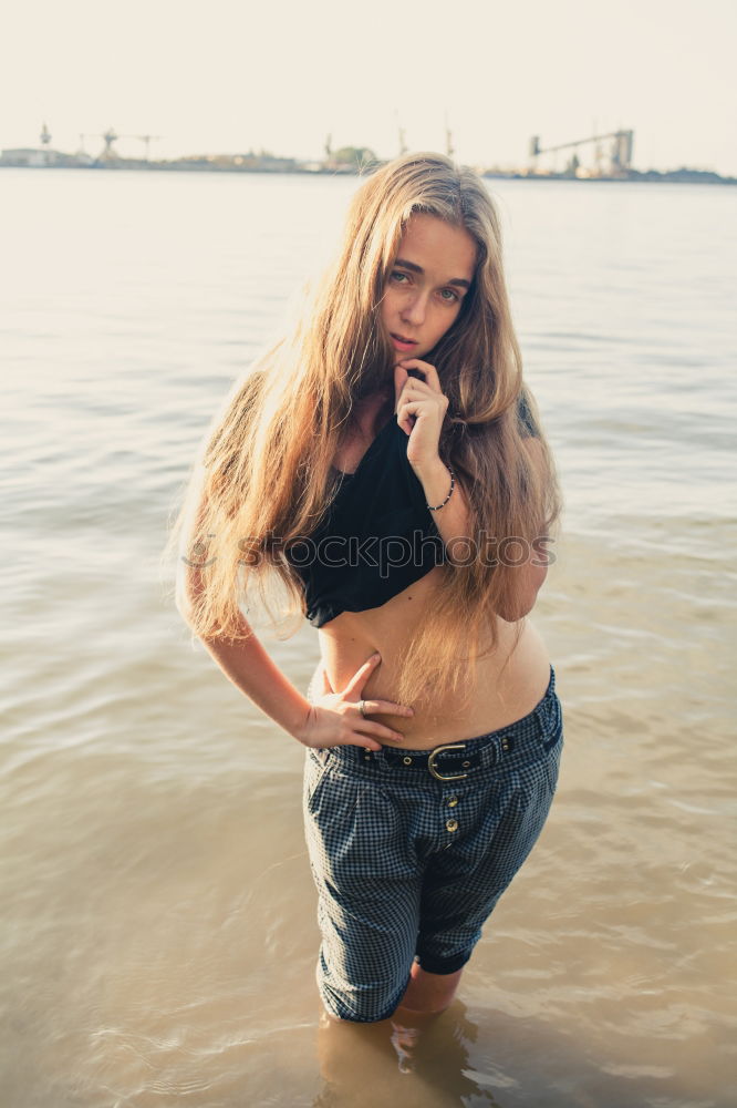 Similar – Image, Stock Photo Portrait of a young fit beautiful healthy blonde woman posing