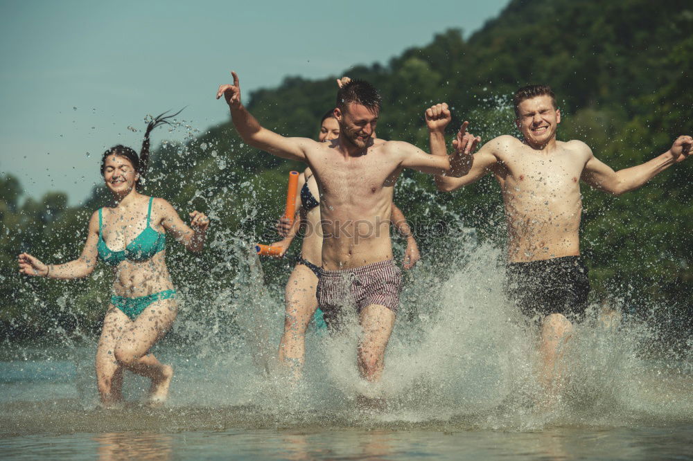 Similar – Image, Stock Photo Group of hipster friends cheering with confetti in sunset