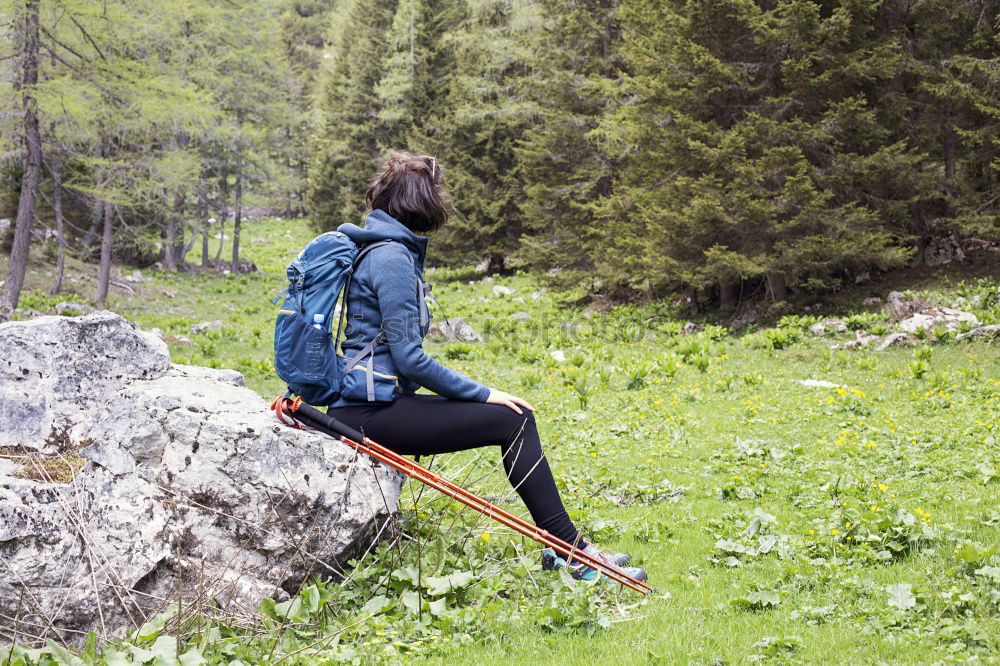 Similar – Image, Stock Photo Couple doing trekking looking with binoculars