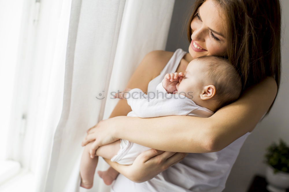 Similar – Baby girl playing with mother and have fun