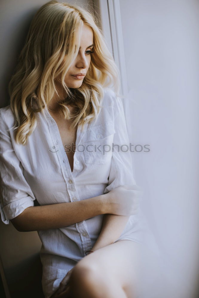 Similar – Image, Stock Photo Happy young blond woman sitting on urban autumn background.