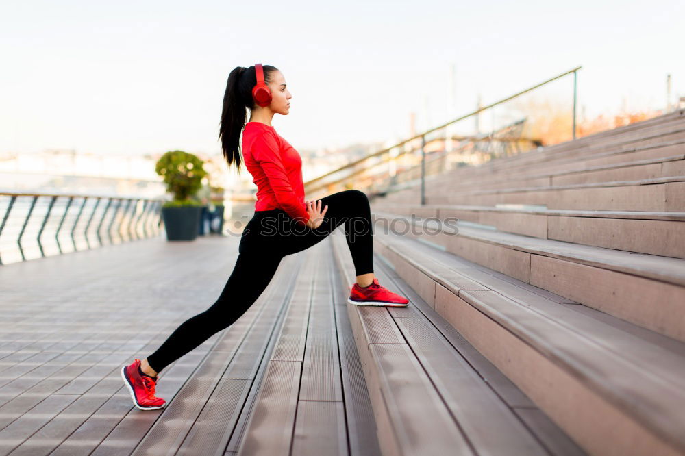 Similar – Image, Stock Photo Athletic woman running up stairs during cardio