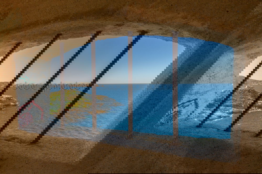 Similar – Image, Stock Photo Bank at the sea in front of wall