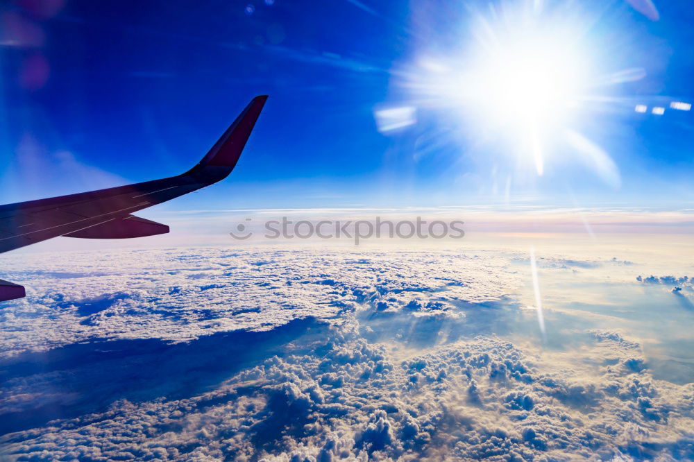 Similar – Aeroplane view into the setting sun