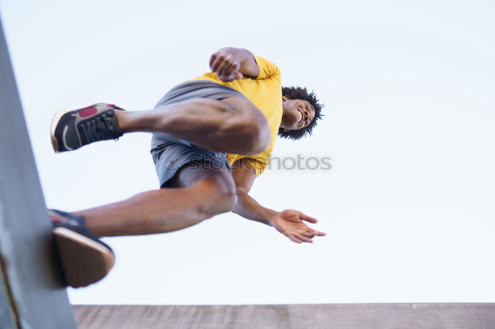 Similar – Woman with afro hair climbing by children’s attractions.