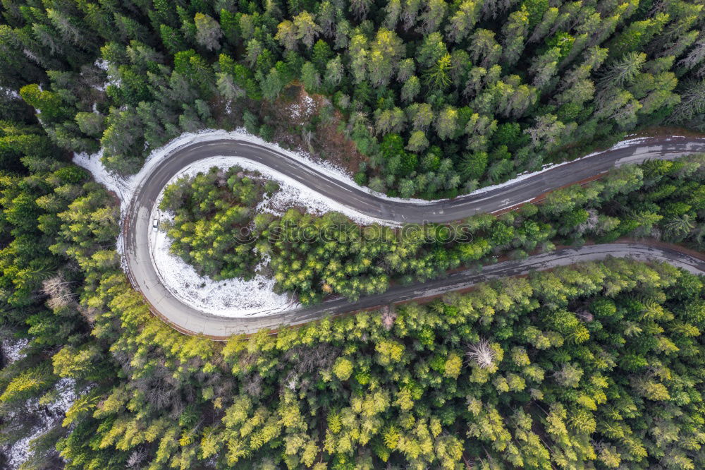 Similar – Aerial view of a road along the river