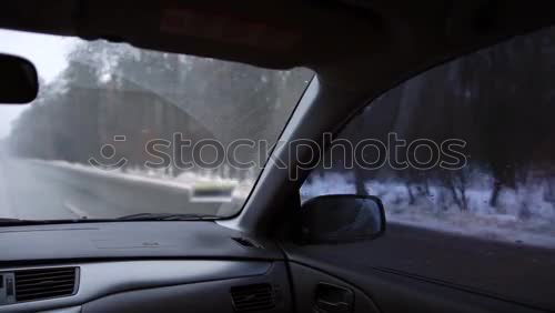 Similar – Person driving in snowy day