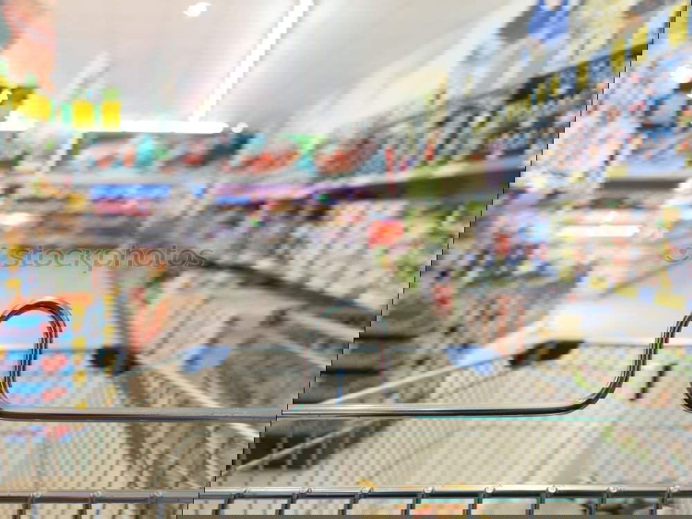 Similar – Image, Stock Photo Empty shopping cart in the supermarket corridor