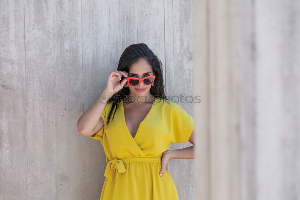 Similar – Image, Stock Photo Woman with aviator sunglasses next to a brick wall