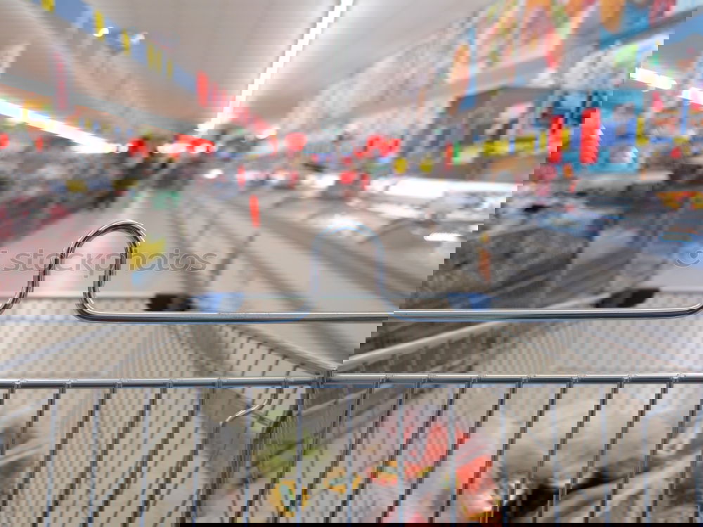 Similar – Image, Stock Photo Empty shopping cart in the supermarket corridor