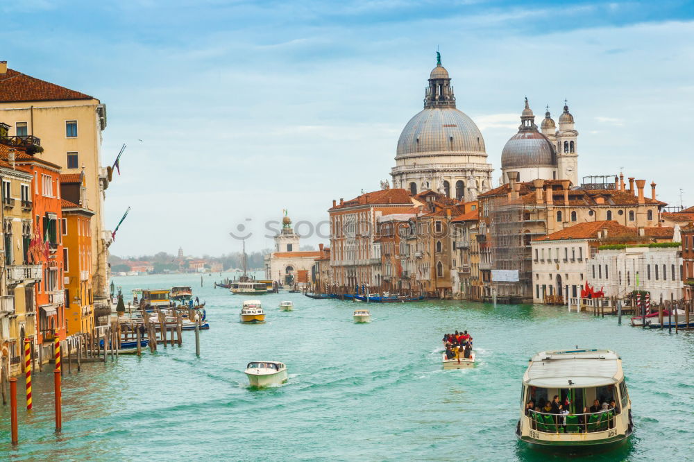 Similar – Urban landscape of Venice, water canals with boats.