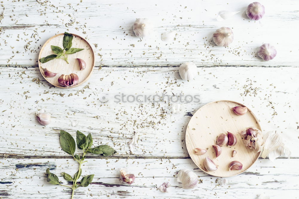 Similar – Image, Stock Photo Removing the grains of a head of garlic