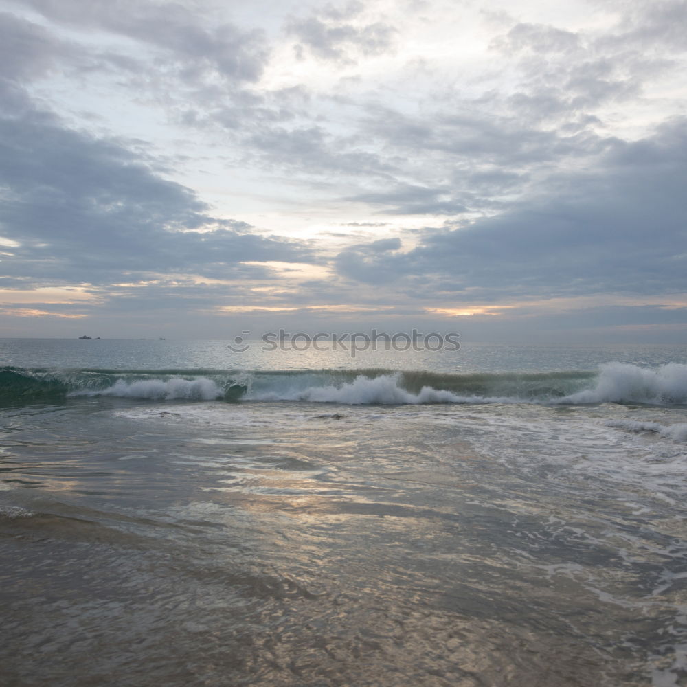 Similar – Steg mit Sonnenschutzdach am Strand bei stürmischer See