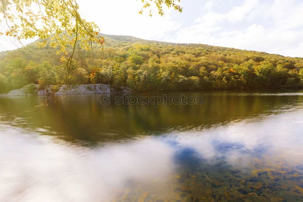 Similar – Image, Stock Photo Park bench with trees on the lake shore