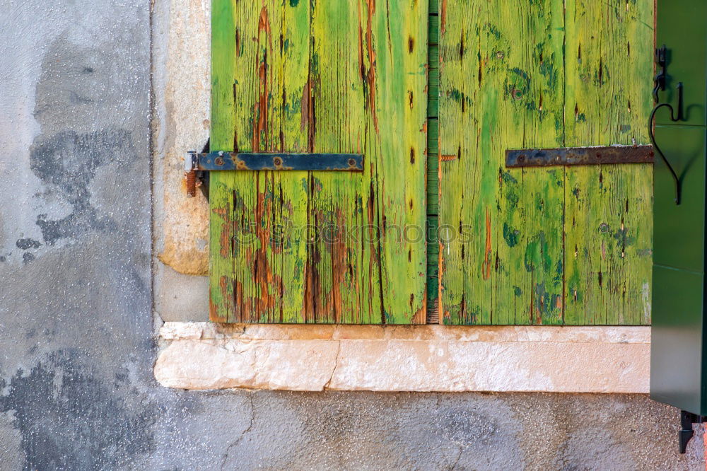 Similar – Small stool with blanket, standing in front of blue door, in the medina.