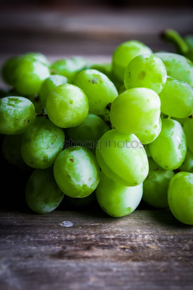 Similar – Bunch of grapes on table