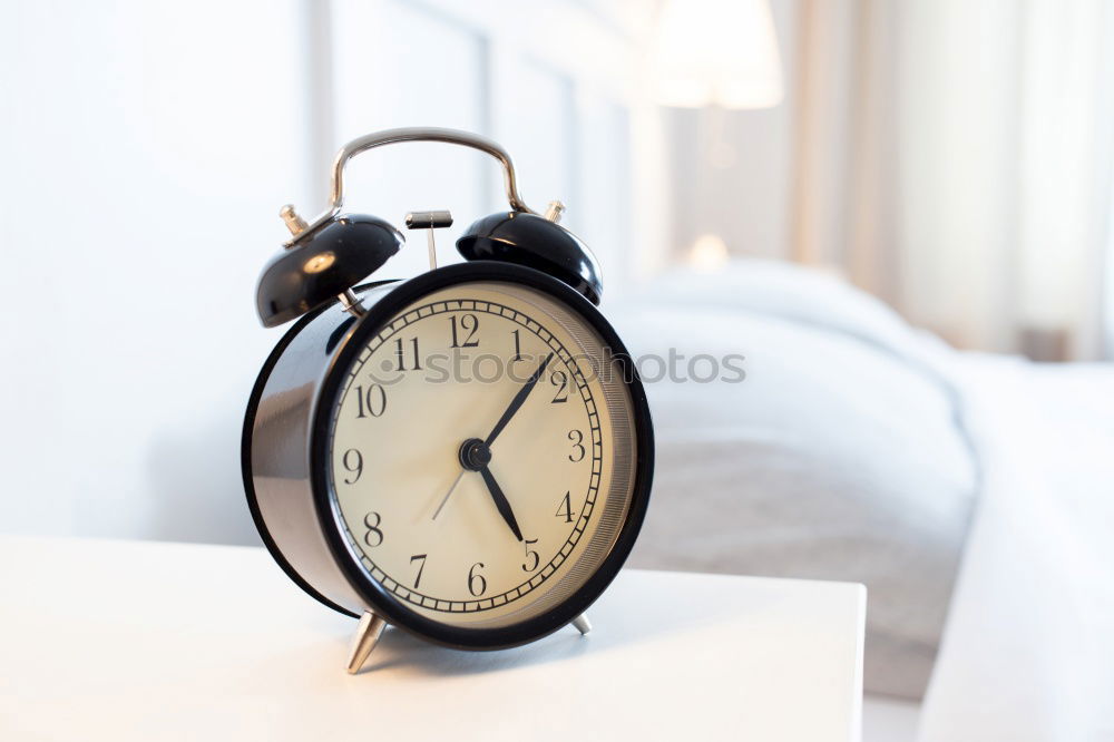 Similar – Wecker um 7 Uhr morgens im Schlafzimmer, Aufwachkonzept