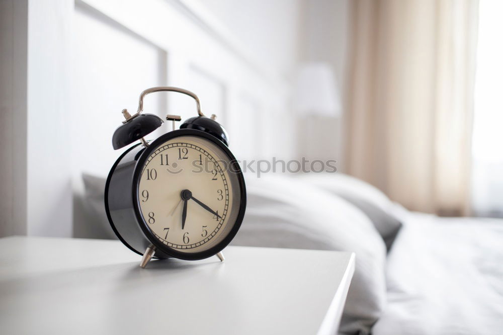 Similar – Wecker um 7 Uhr morgens im Schlafzimmer, Aufwachkonzept