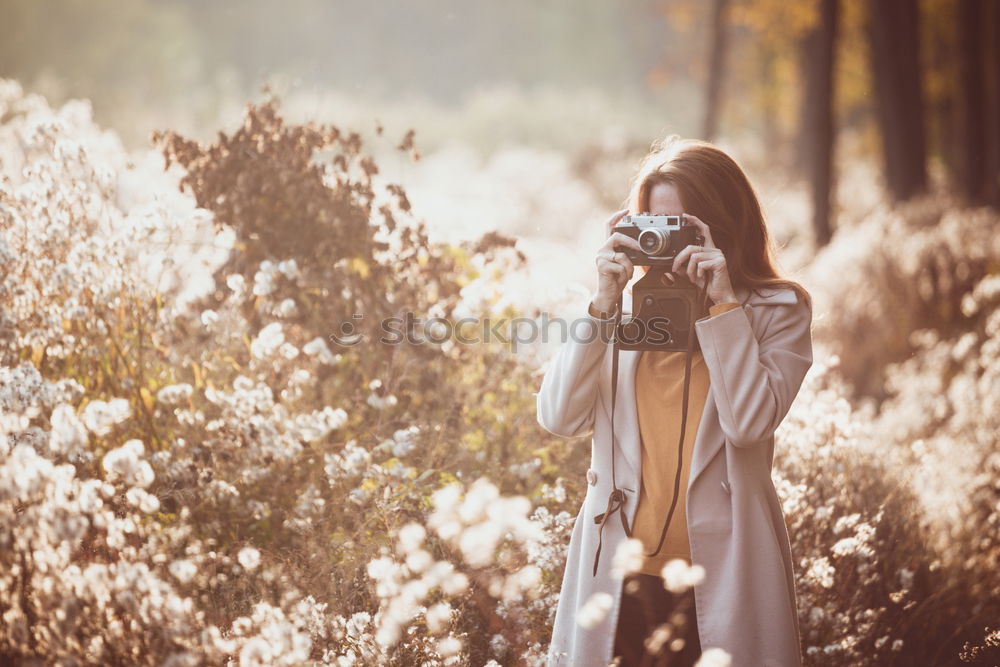 Similar – Image, Stock Photo Smiling girl with camera in the field