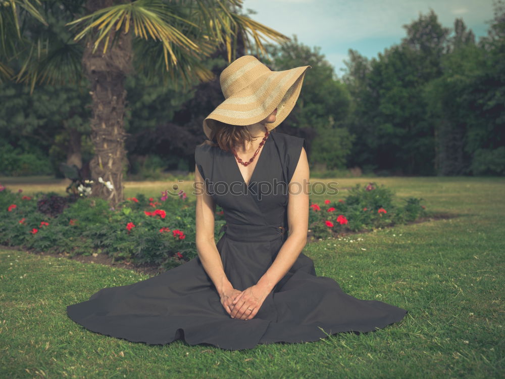 Similar – Image, Stock Photo Cheerful brunette woman lying in grass