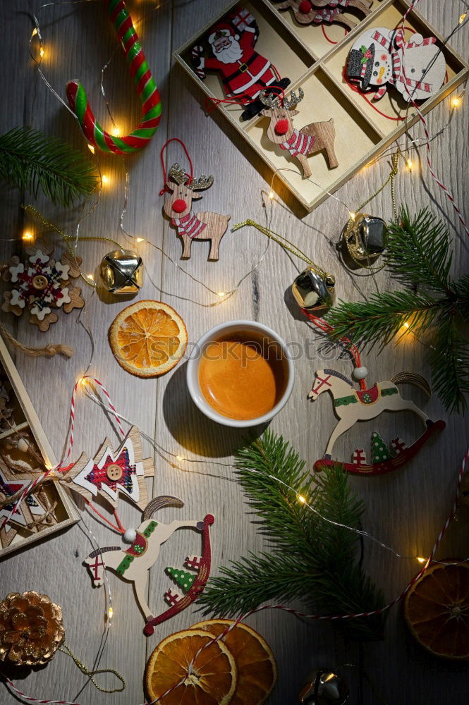 Similar – Christmas table set with biscuits and candles