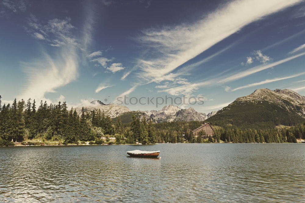 Similar – Wooden dock on lake in mountains