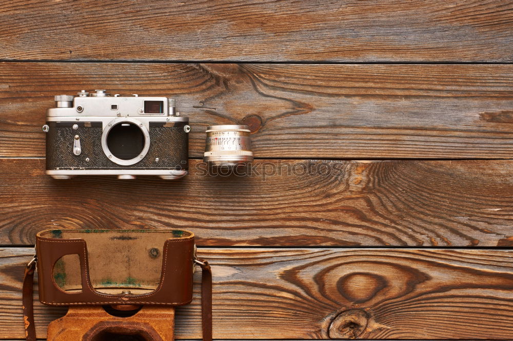 Similar – Image, Stock Photo shoes, notepad, camera, glasses on wooden desk