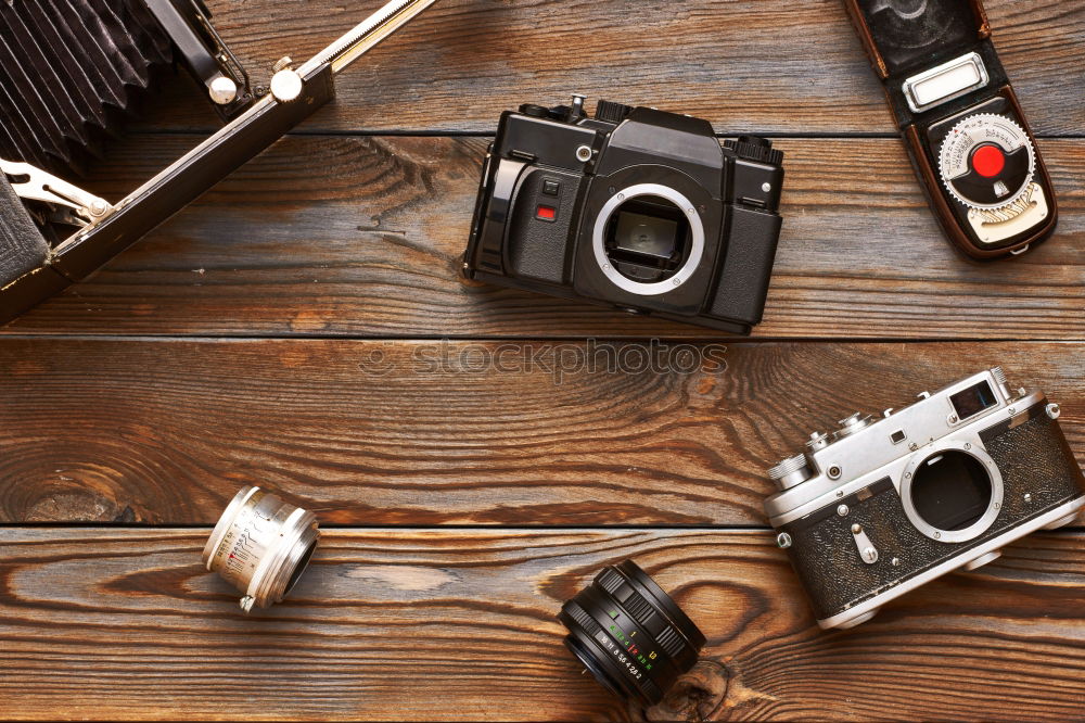 Carburetors for a car engine with tools on wooden table