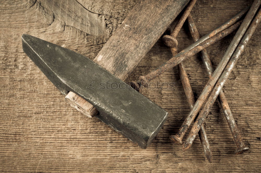 Similar – wooden cutting board and knife with sharpening on the table