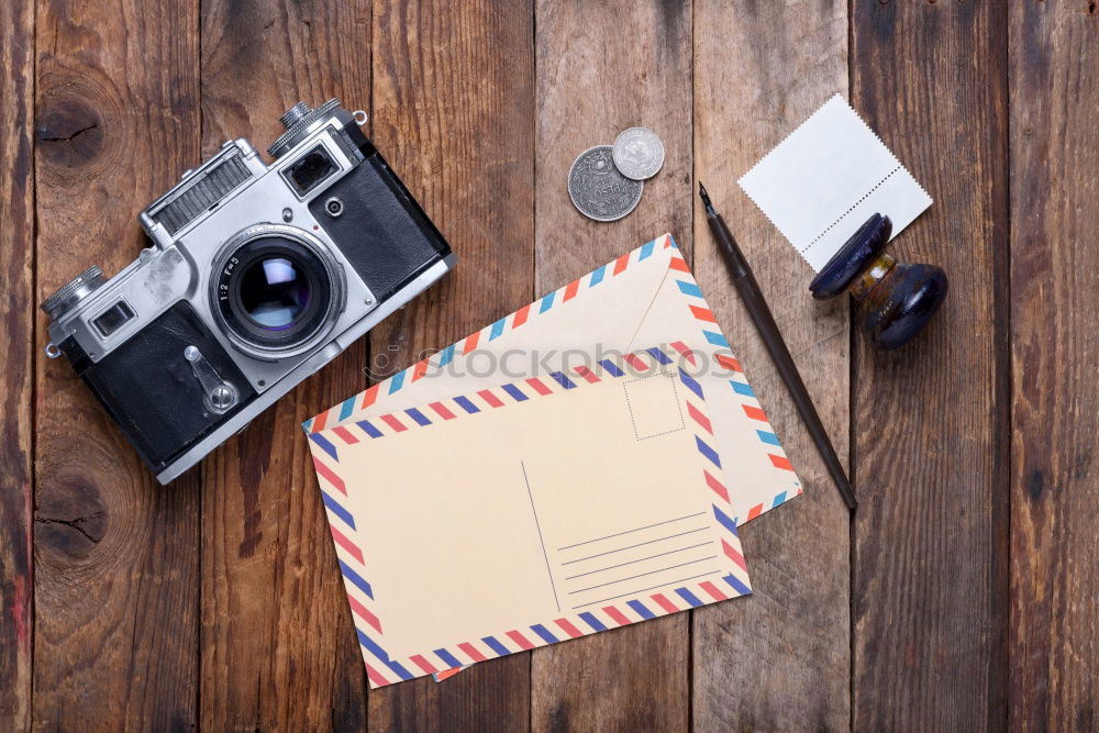 Similar – Camera, glasses and notepad on wood