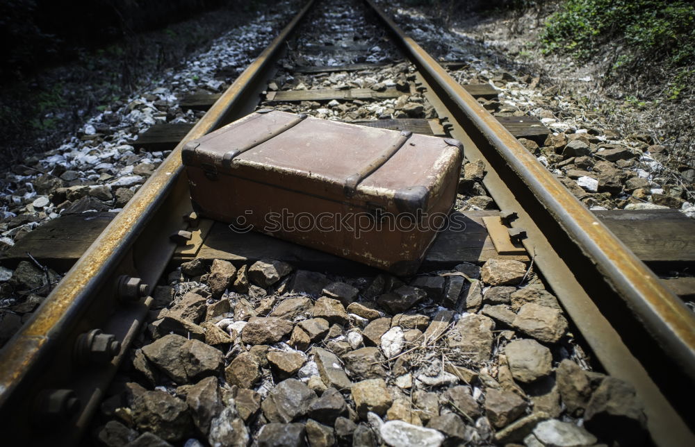 Image, Stock Photo Vintage suitcase on railway road