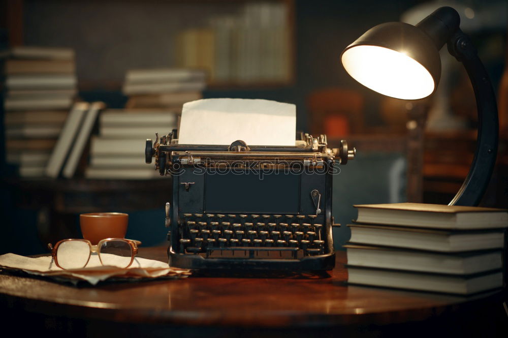 Similar – Traditional and old way of writing messages and taking photos, typewriter, camera, watch, pen, Vintage lamp on the desk