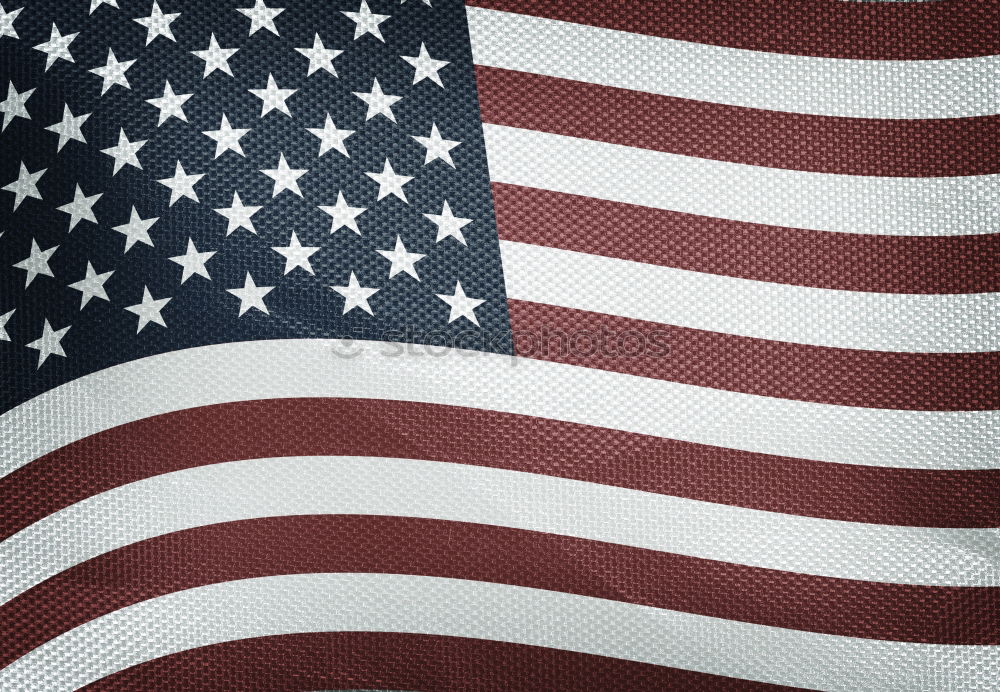 Casual man with American flag on street