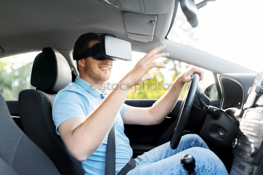 Similar – Taxi driver in a mask with a client on the back seat wearing mask