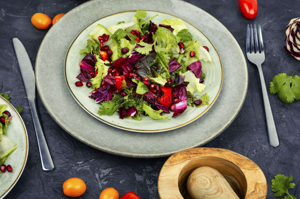 Similar – Green salad with pomegranate, manna croup, onion