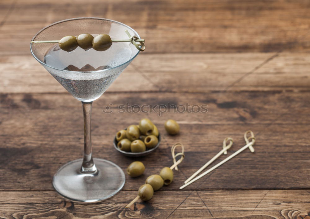 Similar – Image, Stock Photo Classic Dry Martini with olives