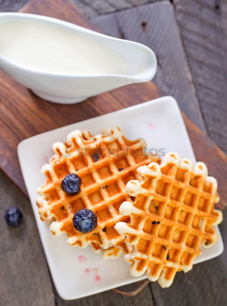 Similar – Image, Stock Photo Breakfast belgian with waffles with ice on white wooden table