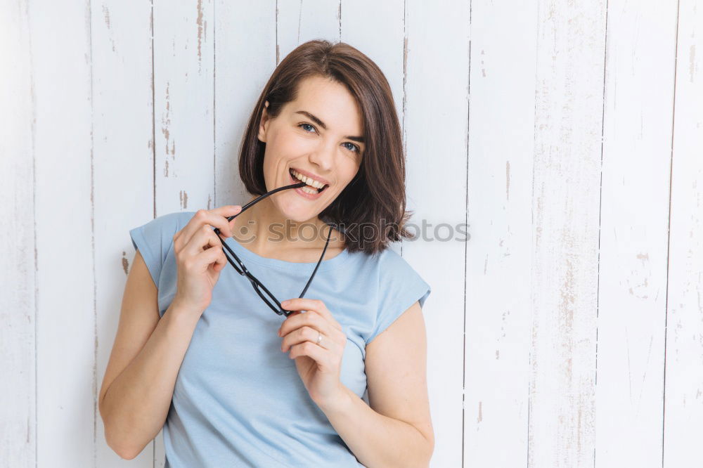 Similar – Crop woman eating sushi