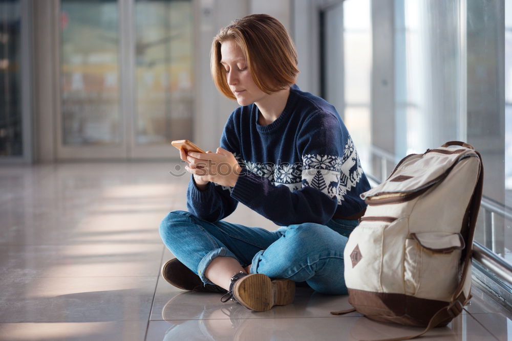 Similar – Image, Stock Photo Young woman sitting reading on urban steps