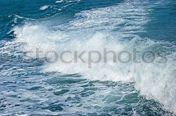 Similar – Foto Bild graublaue Nordseewelle mit Silberschimmer