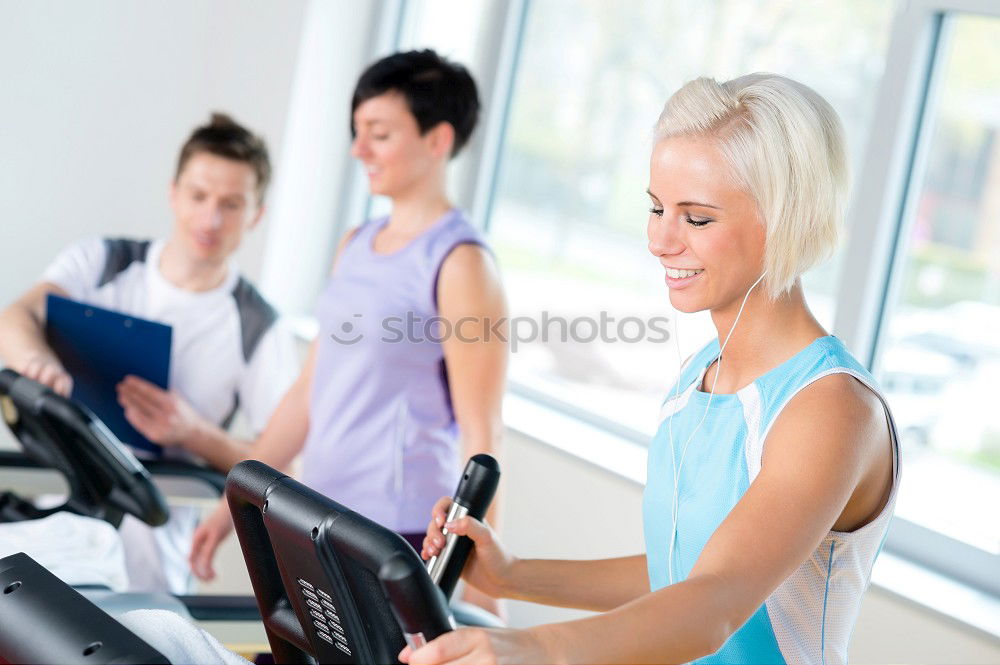 Similar – Image, Stock Photo Attractive Woman with headphones on treadmill in the gym