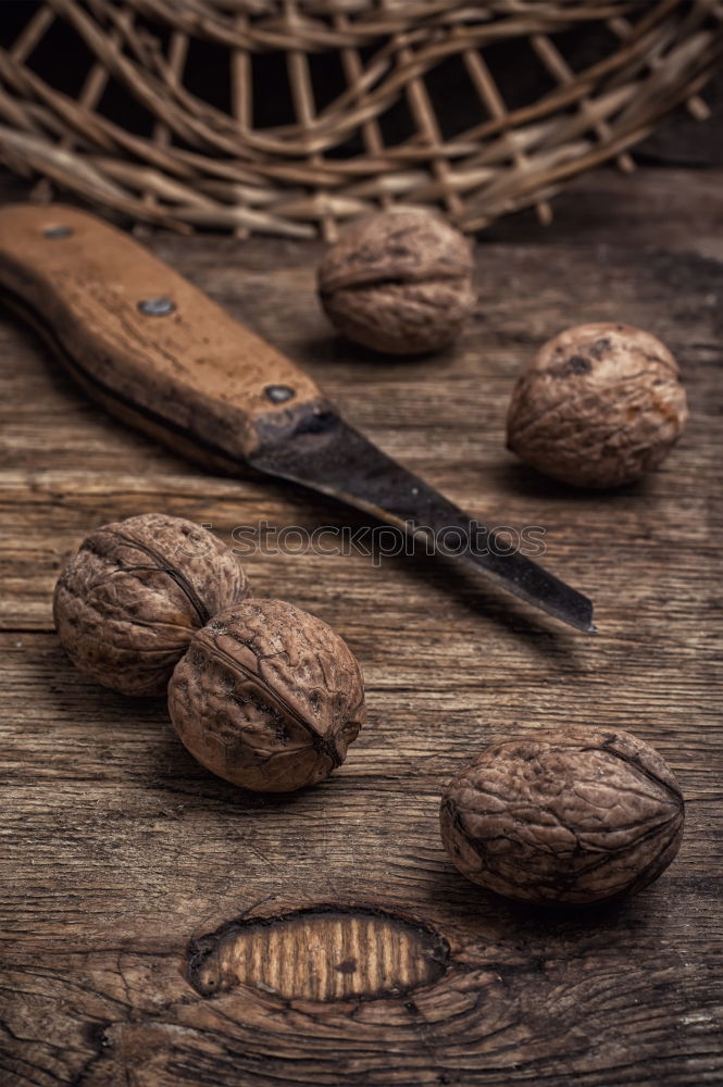 Similar – Image, Stock Photo Organic potatoes with knife on rustic wood