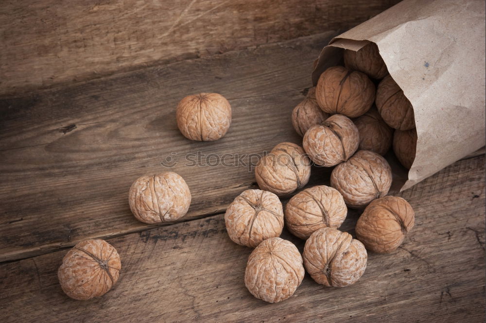 Similar – Image, Stock Photo Fresh walnuts with a nutcracker