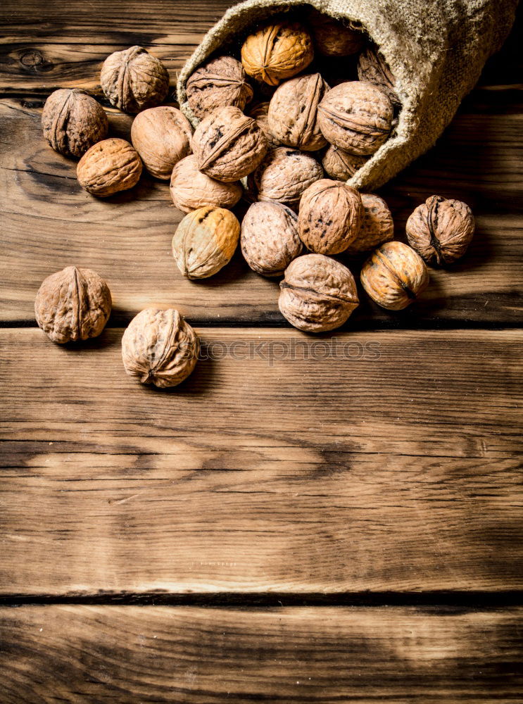 Image, Stock Photo Fresh walnuts with a nutcracker