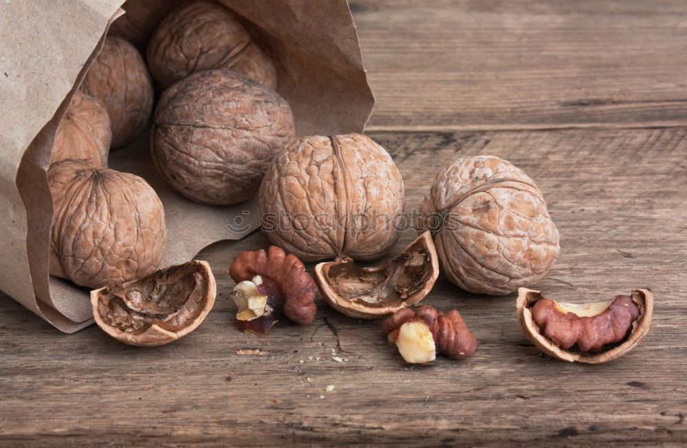 Similar – Image, Stock Photo Fresh walnuts with a nutcracker