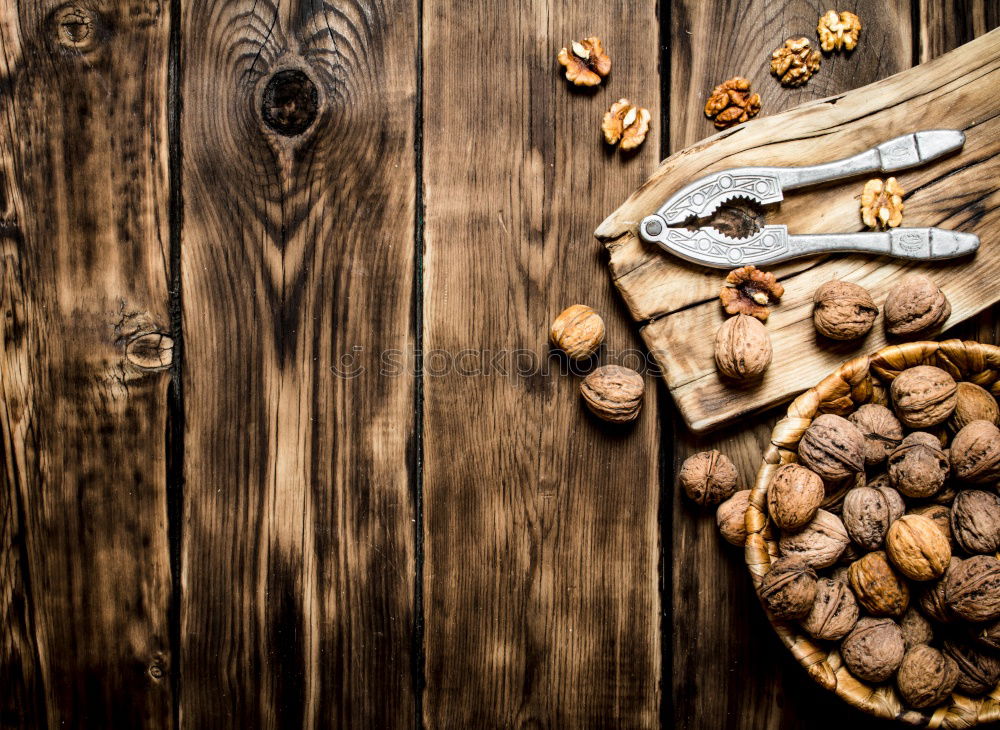 Similar – Image, Stock Photo Fresh walnuts with a nutcracker