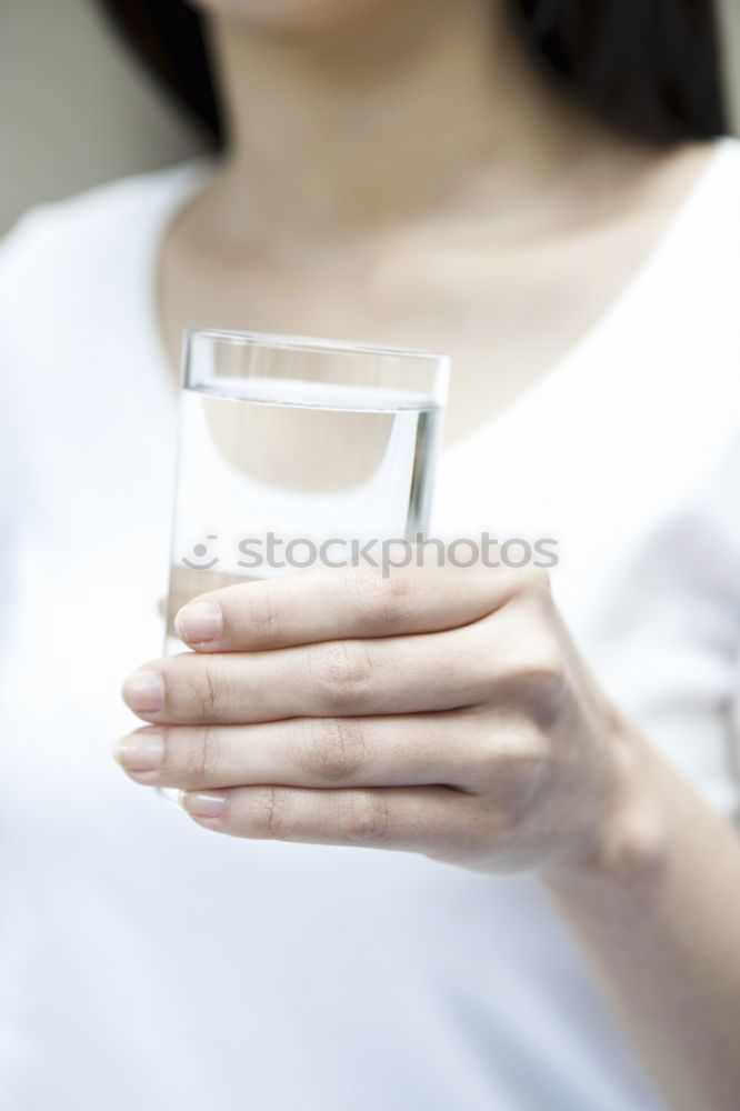 Similar – Image, Stock Photo woman holding mason jar with sassy lemon and mint water